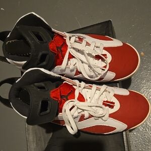 Jordan Red and White Sneakers with Bold Design